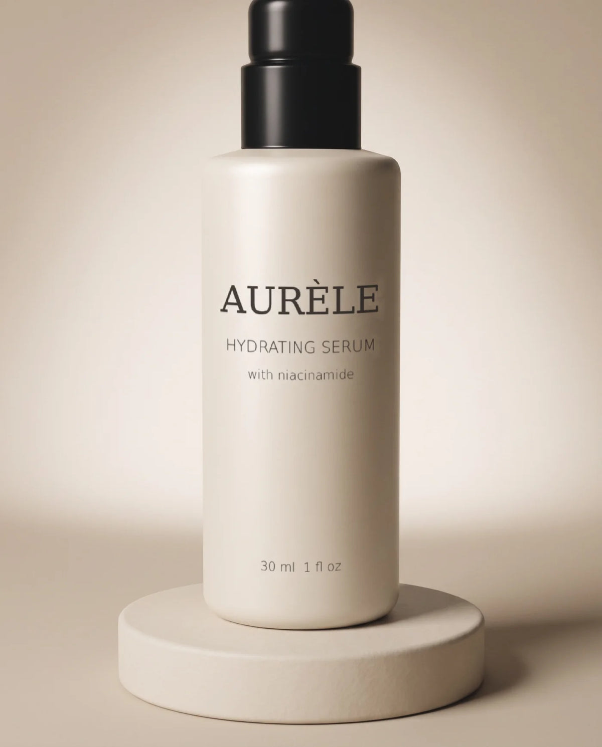 A cream serum bottle with a black cap on a plaster plinth